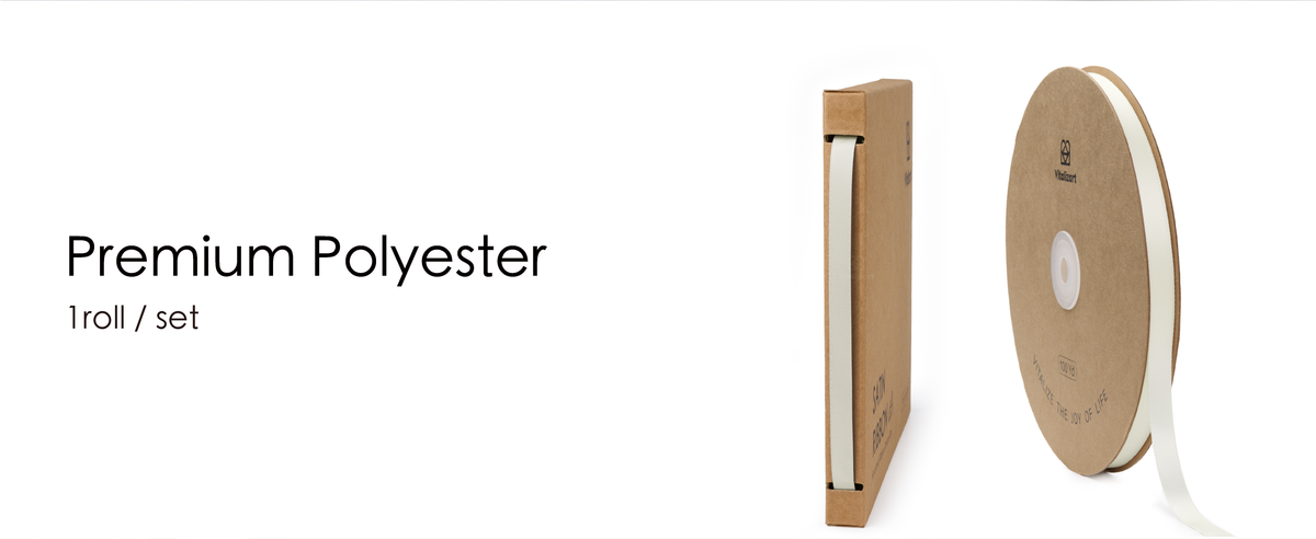 Ivory polyester satin ribbon on a kraft spool beside its matching dispenser box