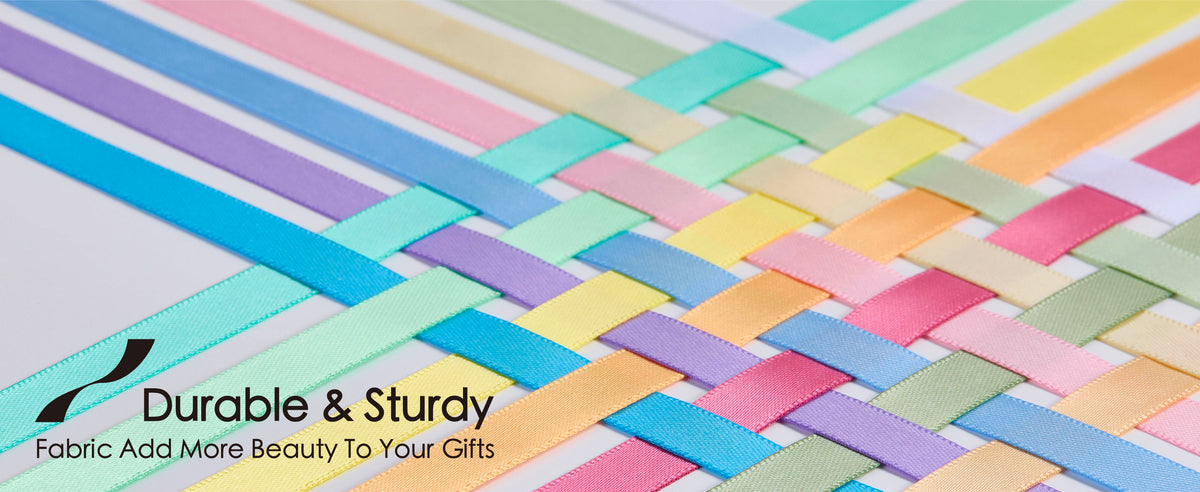 Interwoven strands from the pastel double-faced satin ribbon set displayed in coordinated colors