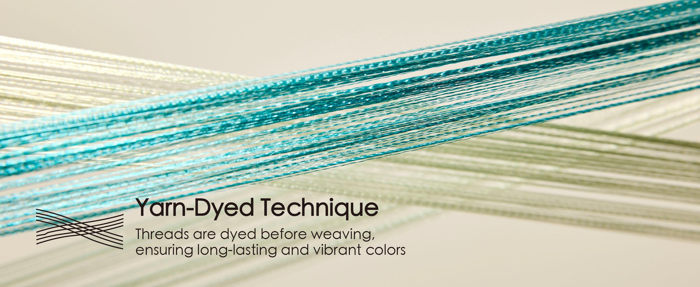 Close-up of the mint and sage double-faced satin ribbon set showing its woven edge and smooth satin texture