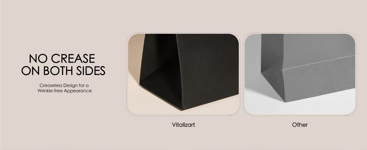 Black paper gift bag with a smooth side compared with a visibly creased gray bag.