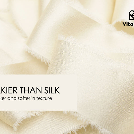 Close-up of ivory white frayed silk satin ribbon texture