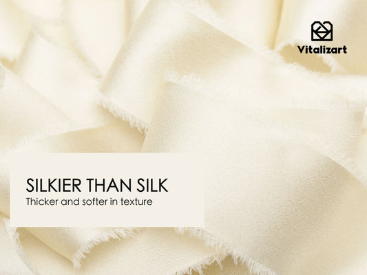 Close-up of ivory white frayed silk satin ribbon texture