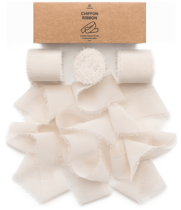 Light nude fringe chiffon ribbon roll on a white background
