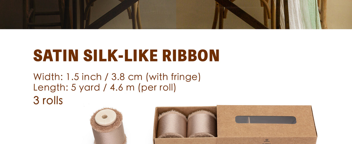 Three rolls of champagne satin-like ribbon with wooden spools and handmade frayed edges