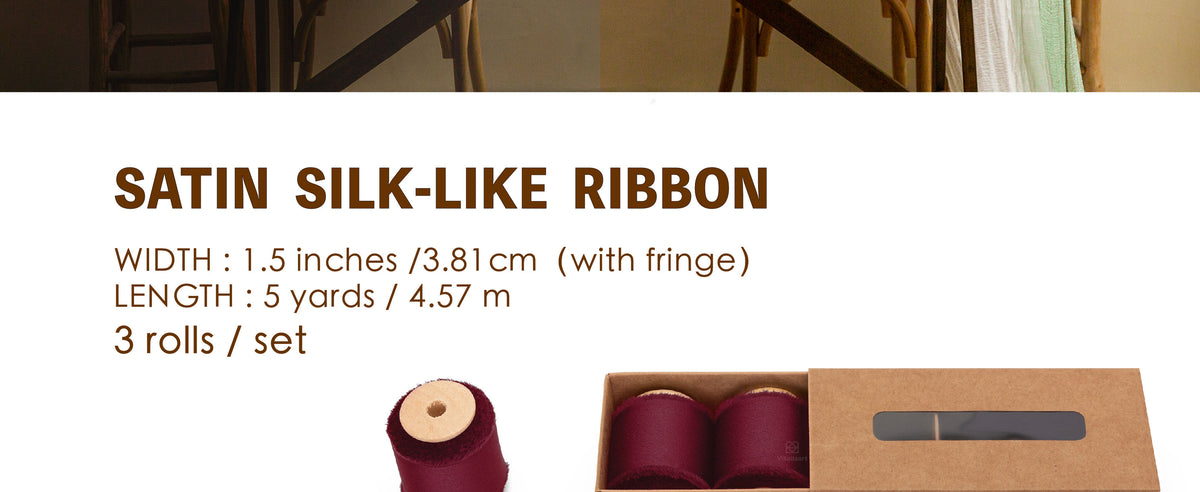Set of three burgundy satin-like ribbon rolls on wooden spools with handmade frayed edges