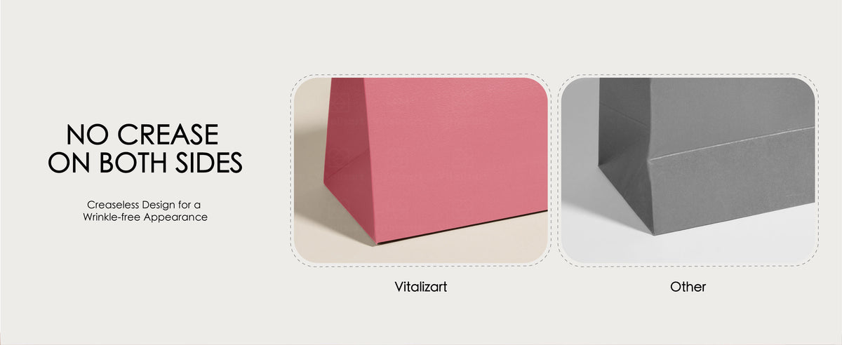 Close-up comparison of a smooth pink paper gift bag and a gray bag with a visible side crease.