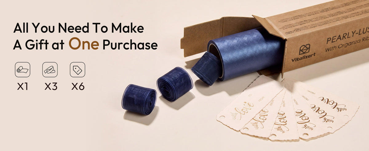 Blue metallic grid wrapping paper set with one paper roll, three sheer ribbons, and six cream gift tags.
