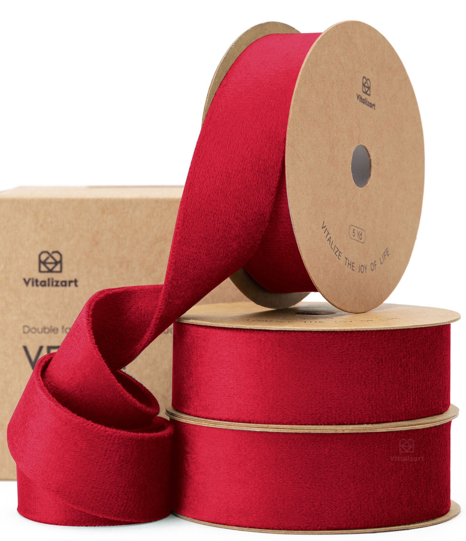 Red double-faced velvet ribbon on a spool