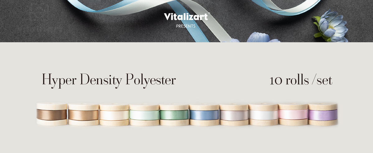 Ten wooden spools hold assorted pale polyester satin ribbons in neutral, pastel, and blue tones.