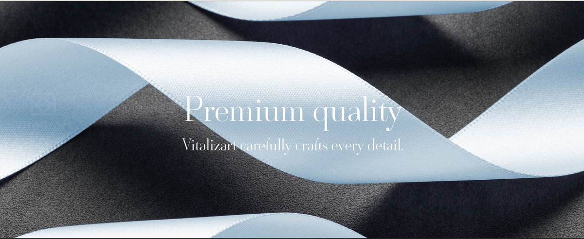 Close-up of light blue and white satin ribbon showing a smooth sheen and neatly finished edges.