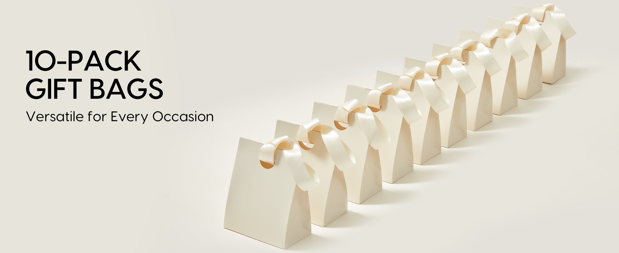 Ten cream-white paper gift bags with glossy satin ribbon handles arranged in a diagonal row.