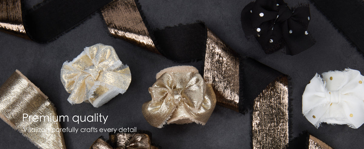 Black polka-dot chiffon ribbon among metallic, frayed-edge ribbons tied into decorative bows.