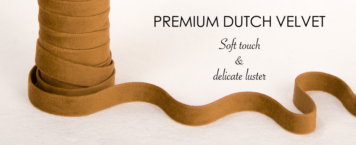 Close-up of layered khaki Dutch velvet ribbon showing its soft pile and subtle luster.