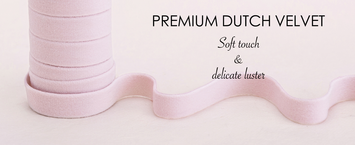 Close-up of the pink and white velvet ribbon set showing a soft plush velvet surface