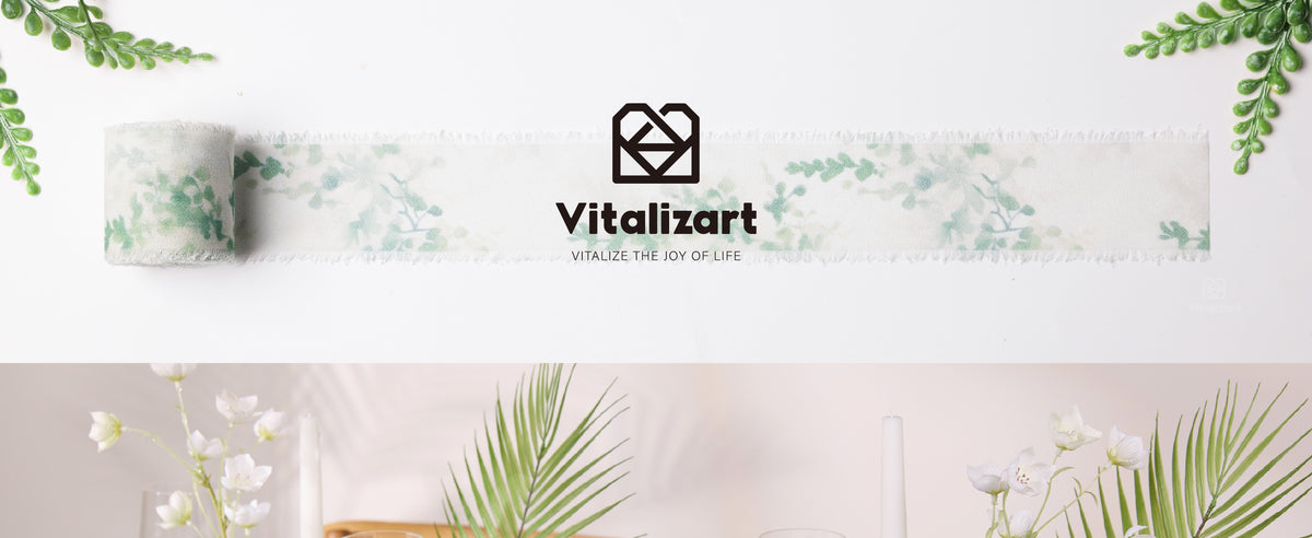 Green leaf-print frayed ribbon decorates wineglasses and napkins on a bright dining table