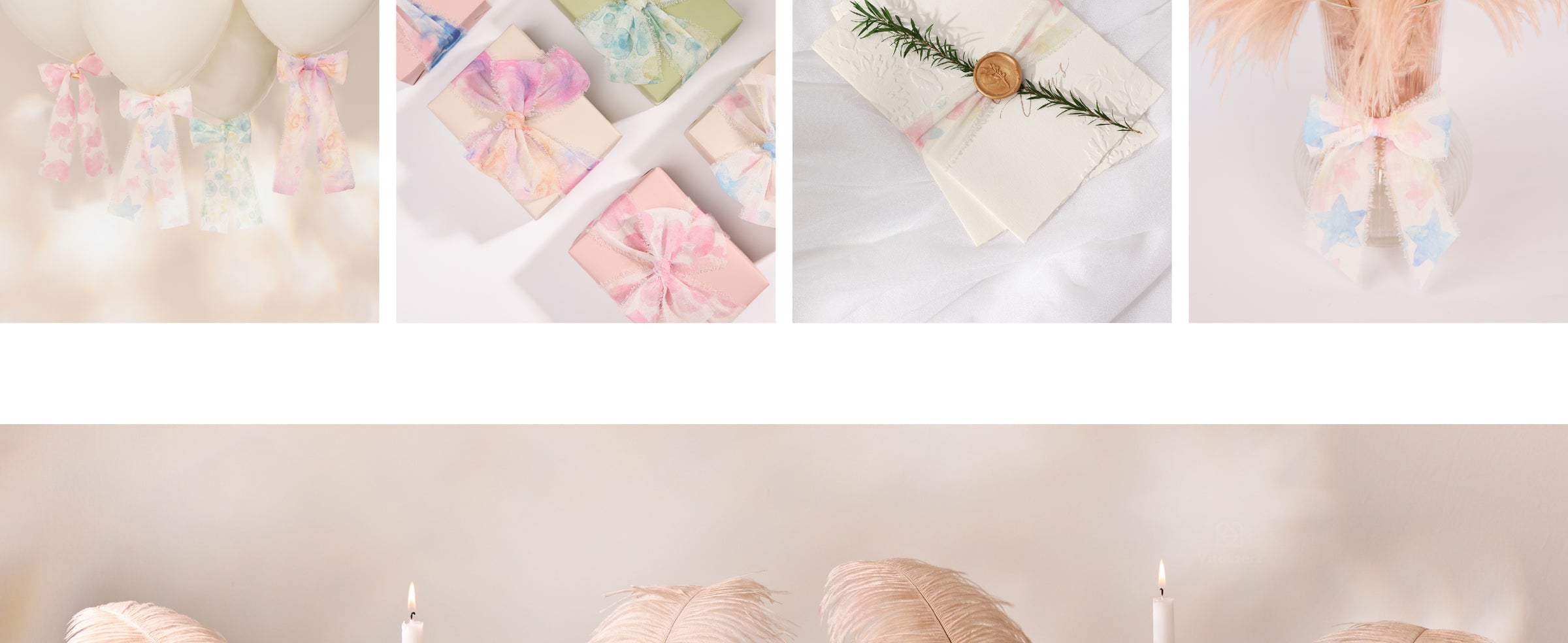 Pastel frayed chiffon ribbon decorating a wax-sealed card and a clear vase filled with blush feathers