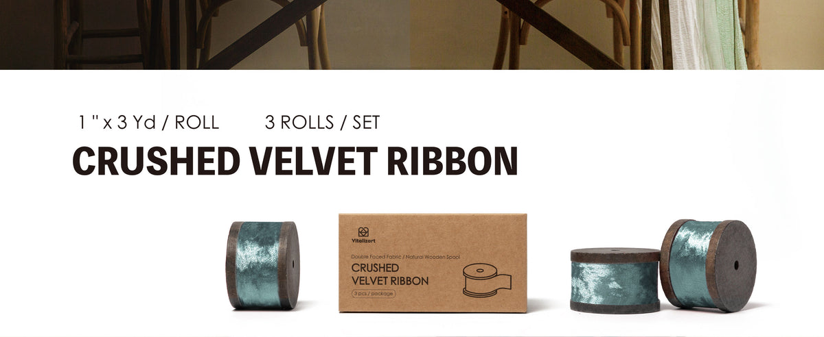 Three rolls of pale blue crushed velvet ribbon on dark wooden spools with kraft packaging