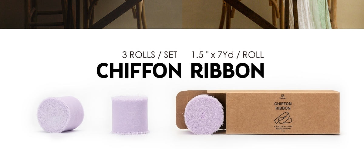 Three pale lavender fringed chiffon ribbon rolls beside an open kraft storage box.