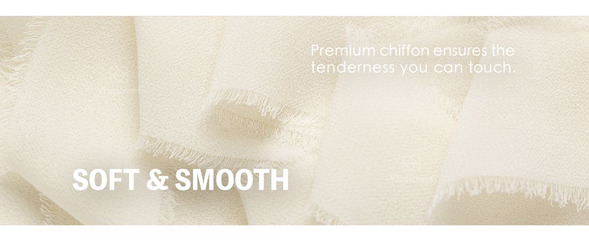 Close-up of cream white chiffon ribbon with a soft woven texture and delicate frayed edges