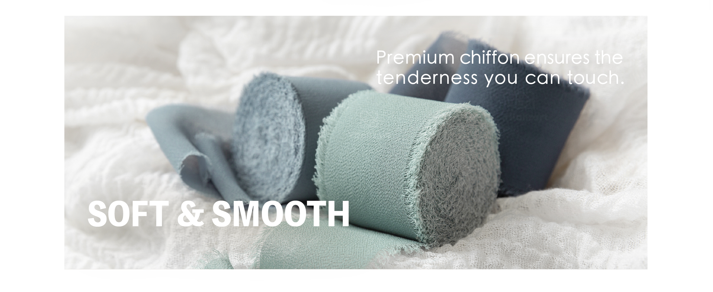 Close-up of dusty blue, pale blue-green, and slate chiffon ribbon rolls with woven texture and fringed edges.
