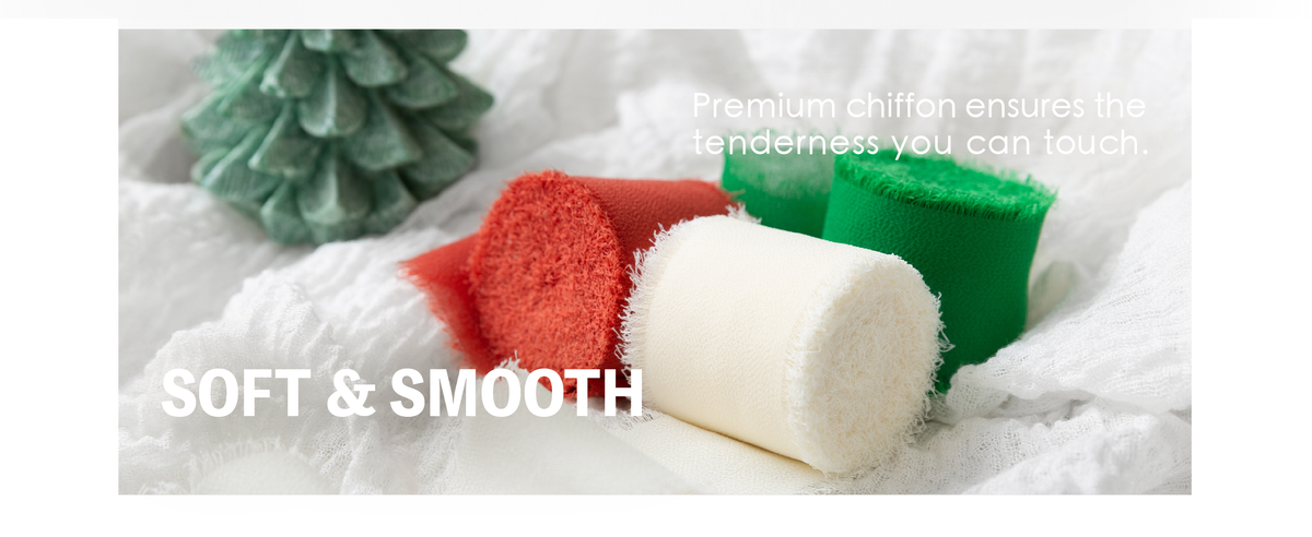 Red, cream, and green frayed chiffon ribbon rolls arranged beside a small decorative tree