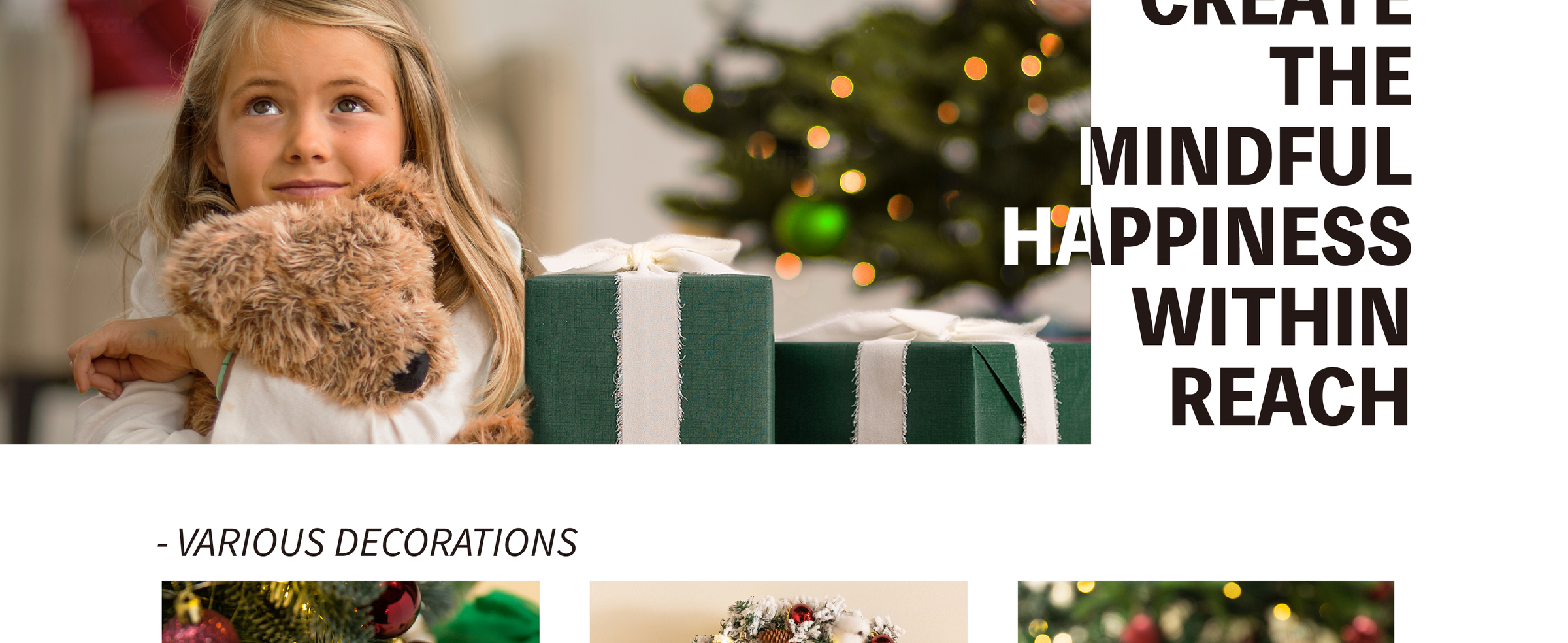 Girl hugging a teddy bear beside a green Christmas gift wrapped with wide white ribbon.