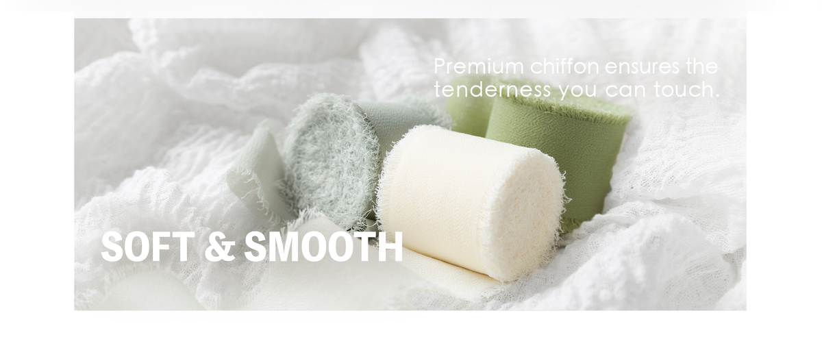 Pale sage, cream, and light green fringed chiffon ribbon rolls arranged on soft white gauze.