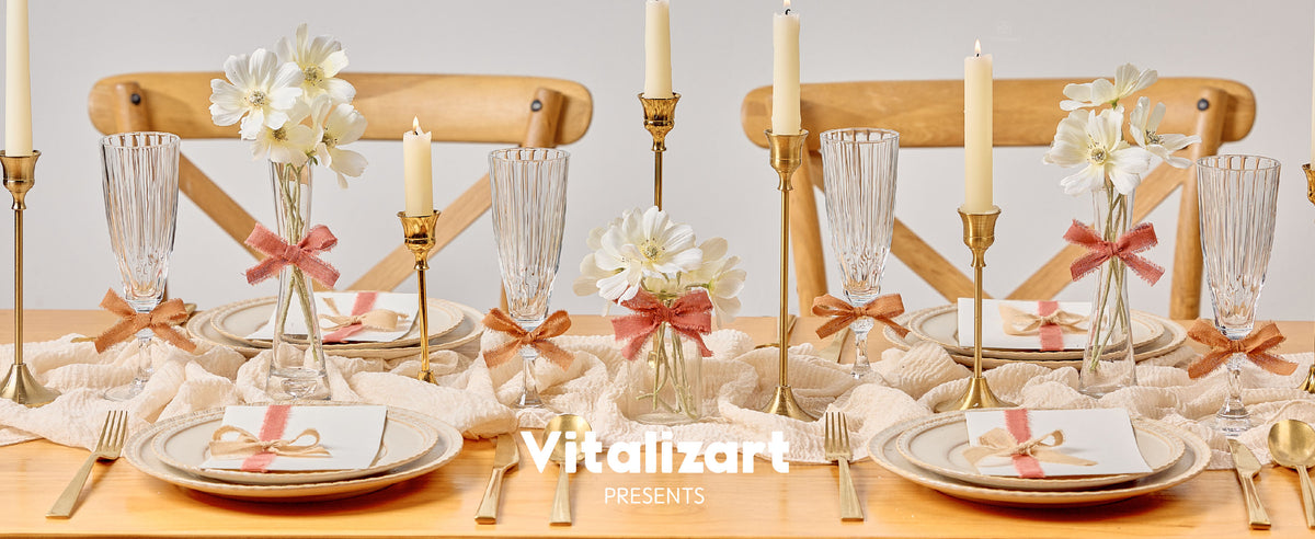 Terracotta fringed cotton ribbon decorates vases, glasses, and place cards on an elegant dining table.
