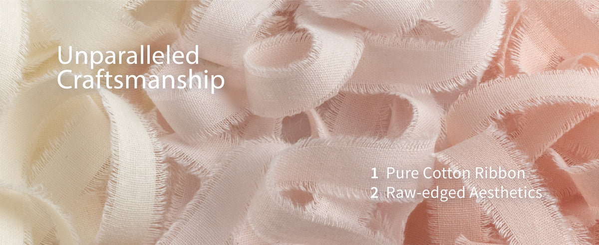 Close-up of ivory, blush, and peach cotton ribbons with woven texture and soft fringed edges.