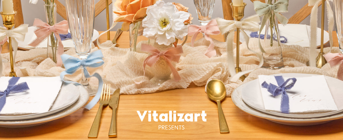 Mixed-color fringed cotton ribbon bows decorate flowers, glasses, candles, and place settings.