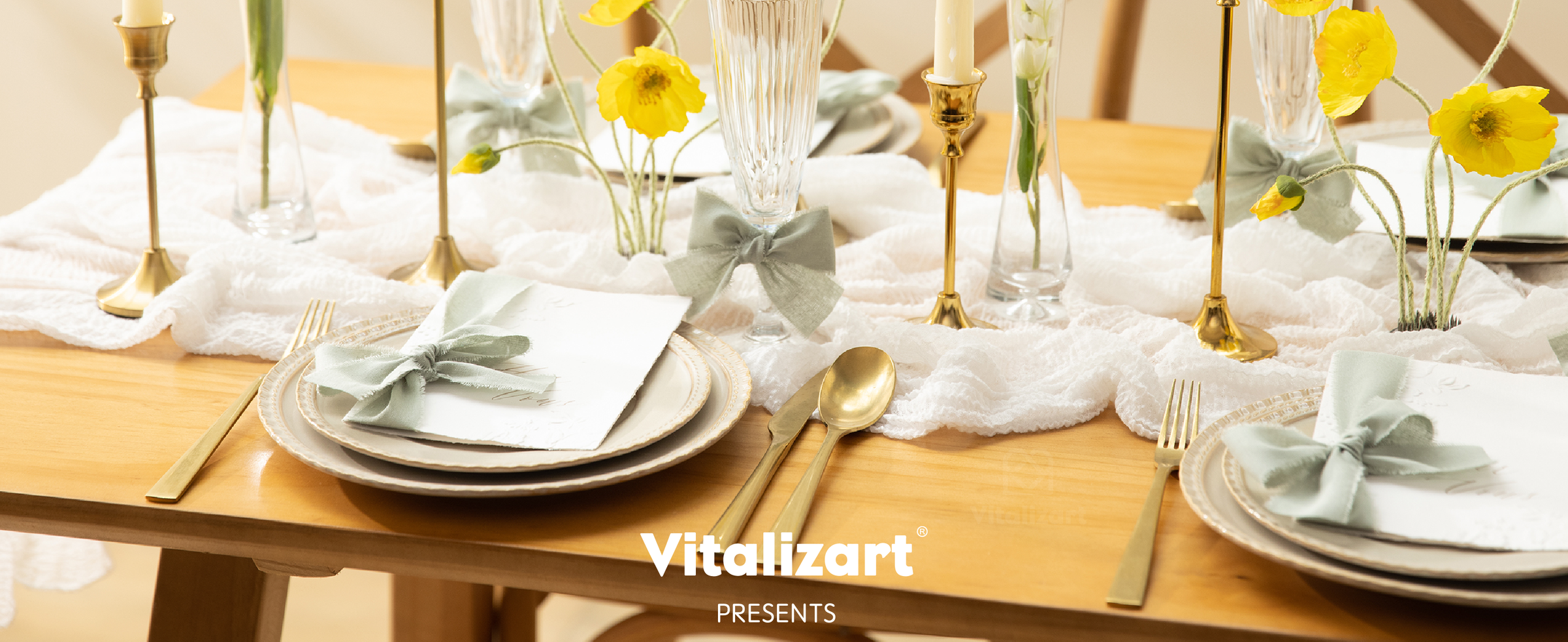 Dusty green cotton ribbon bows accent glasses, cards, and place settings on a floral dining table.