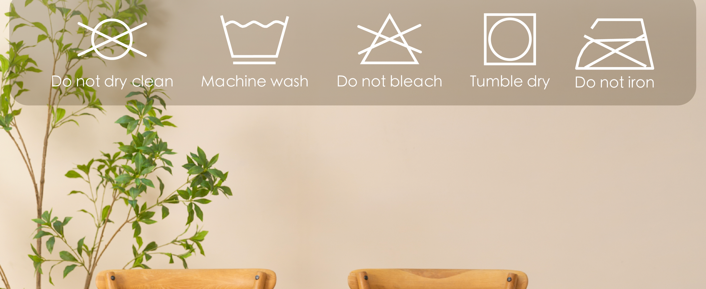 Care instructions for the simply white fringe table runner with washing, drying, and ironing symbols
