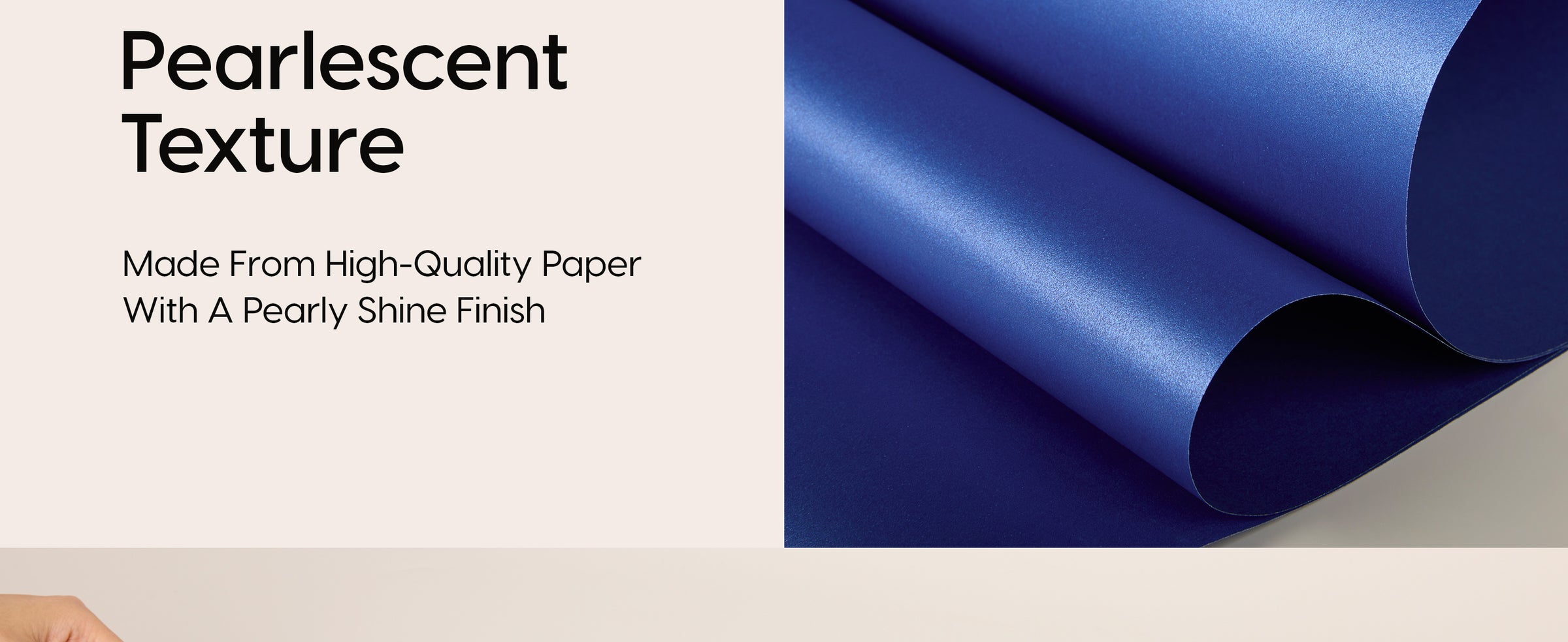 Close-up of flexible deep blue wrapping paper sheets with a fine pearlescent shimmer