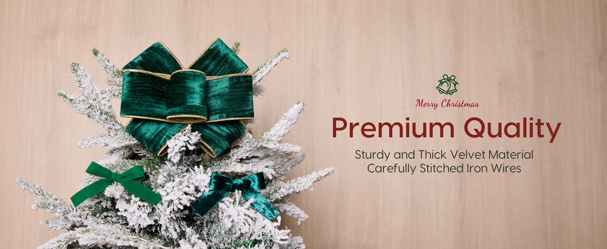 Emerald green velvet ribbon bow with gold-trimmed wired edges displayed on a flocked Christmas tree