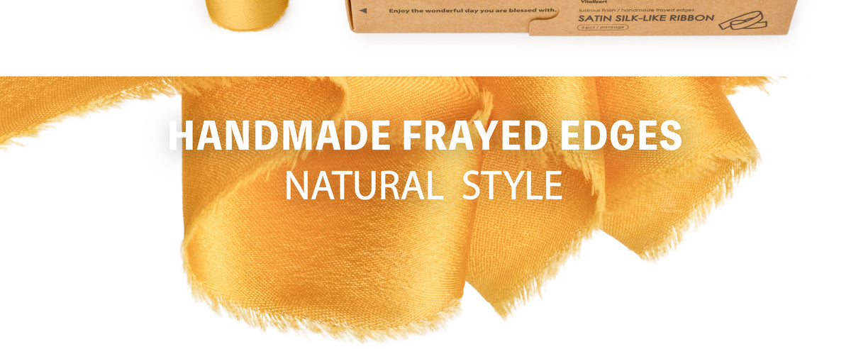 Close-up of glossy gold satin-like ribbon with a smooth woven surface and softly frayed edges.