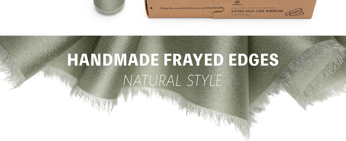 Close-up of dusty green satin ribbon with a smooth sheen and softly frayed edges