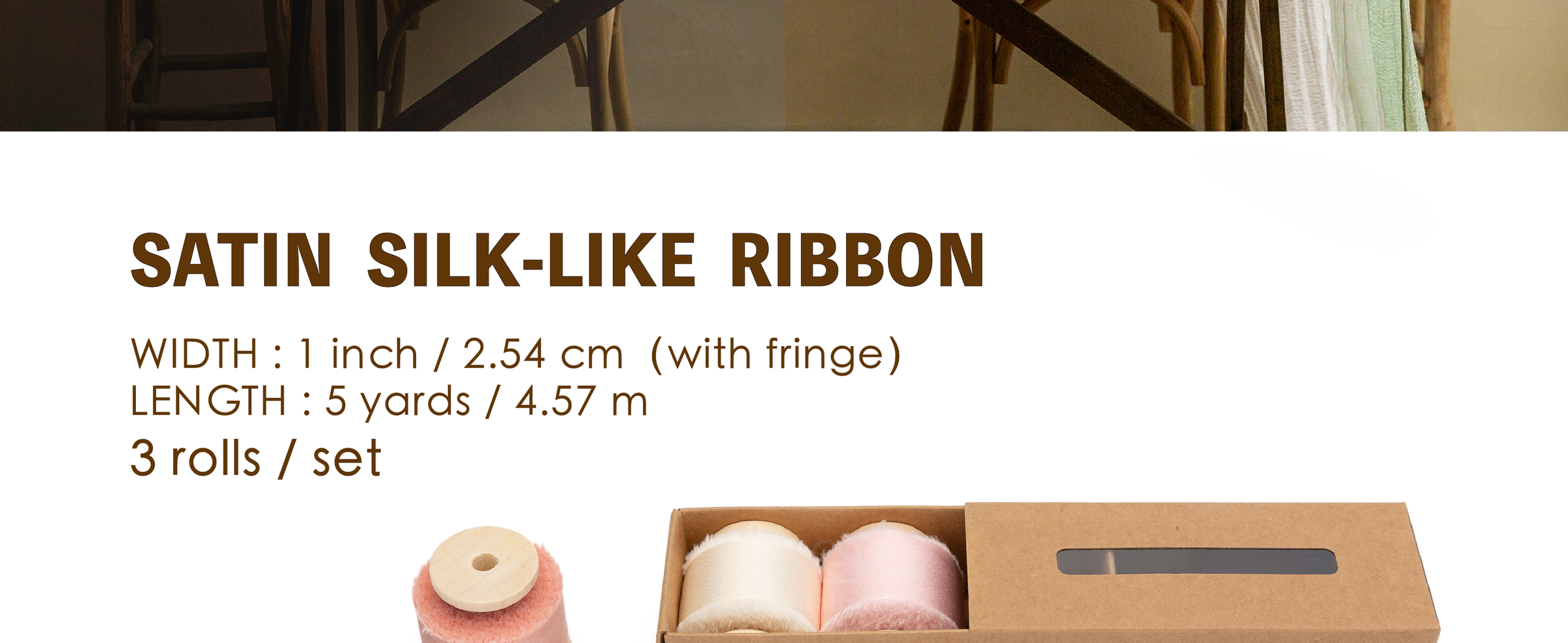 Three coral pink, pale pink, and ivory satin-like ribbon rolls on wooden spools, 1 inch by 5 yards each.