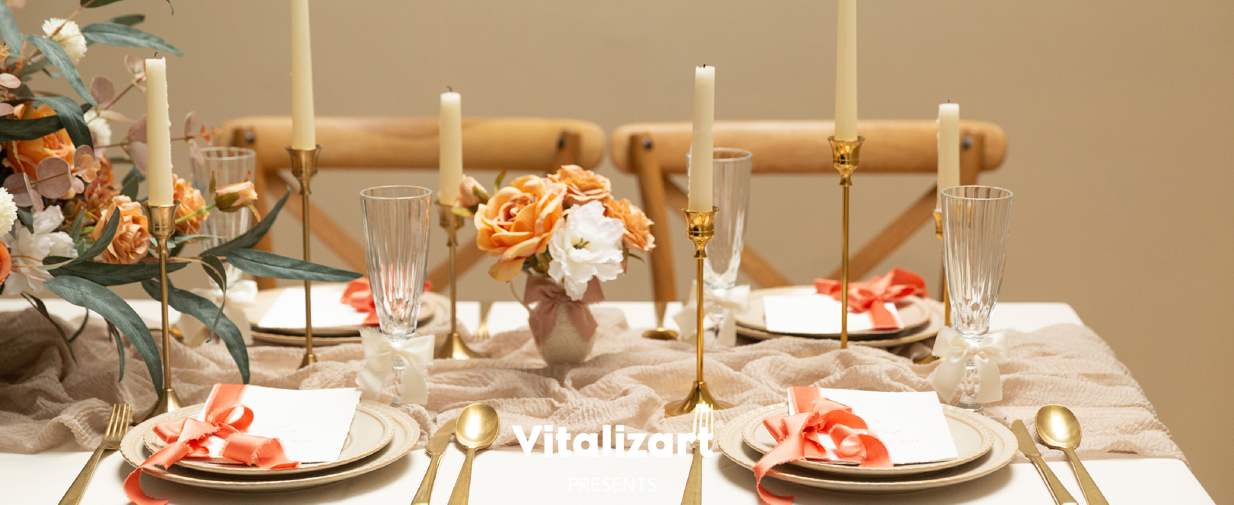 Terracotta, taupe, and cream ribbon bows decorate place settings and glasses on a formal dining table