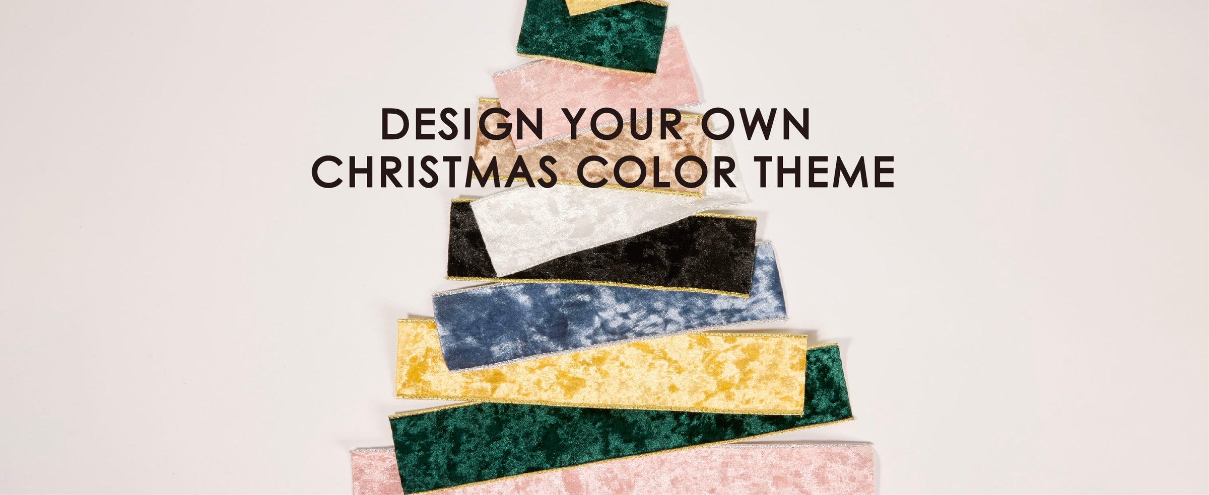Metallic-edged crushed velvet ribbons in assorted colors stacked like a Christmas tree