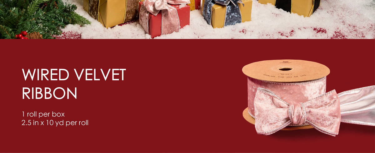Blush pink wired velvet ribbon spool with silver edges, tied bow, and metallic reverse