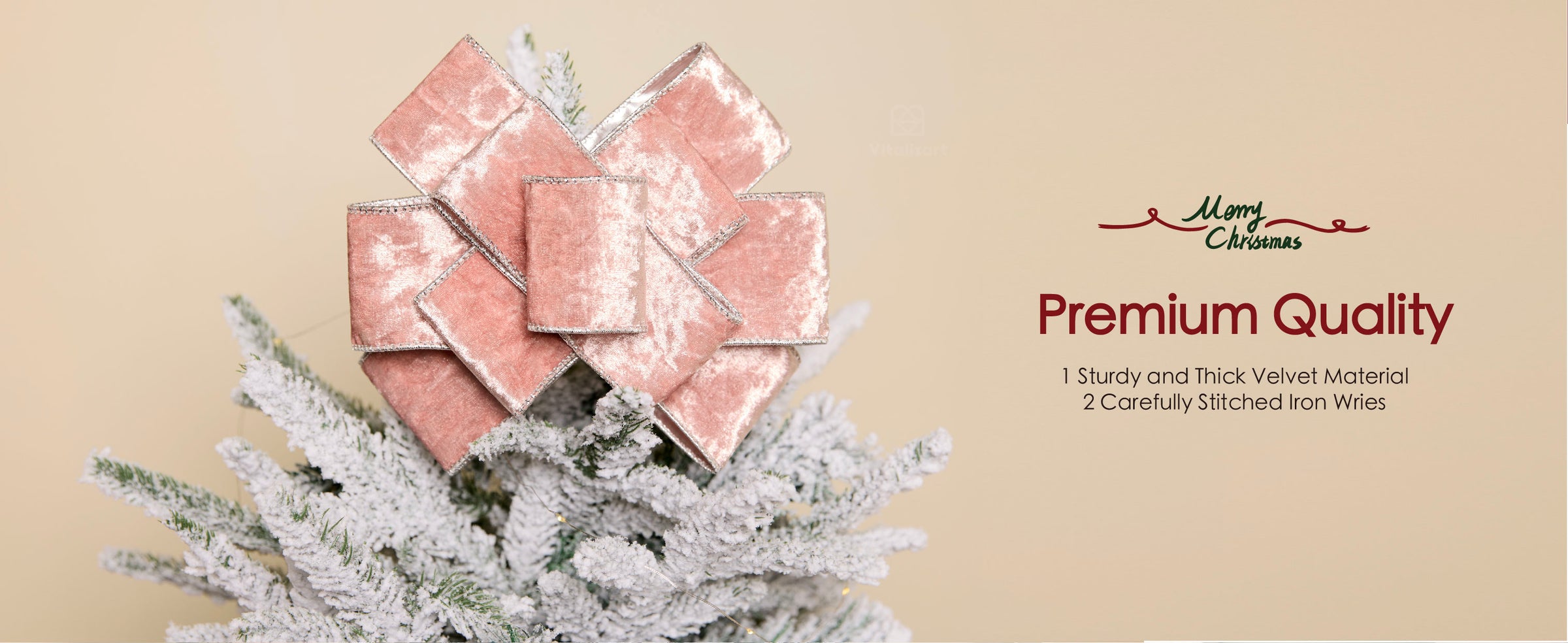 Large blush pink wired velvet bow with silver-stitched edges on a flocked Christmas tree