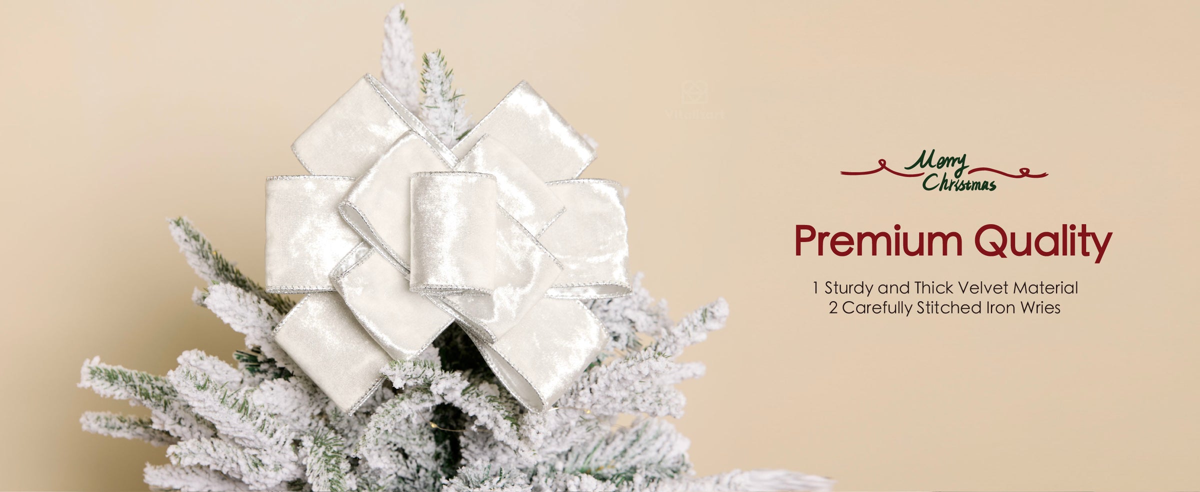 White wired crushed velvet ribbon formed into a large bow on a flocked Christmas tree