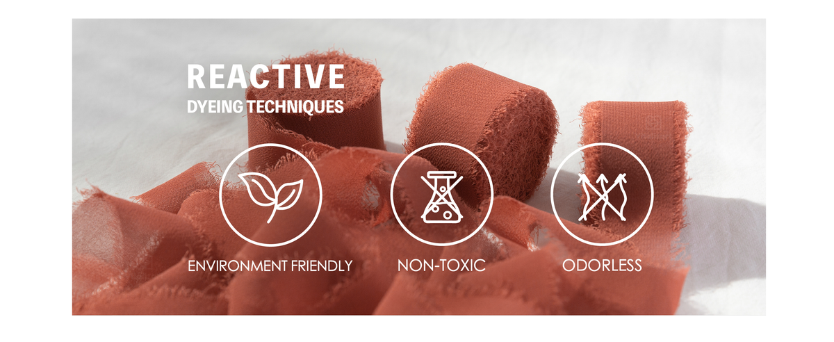 Rust-red frayed chiffon ribbon with icons labeling it environment friendly, non-toxic, and odorless.