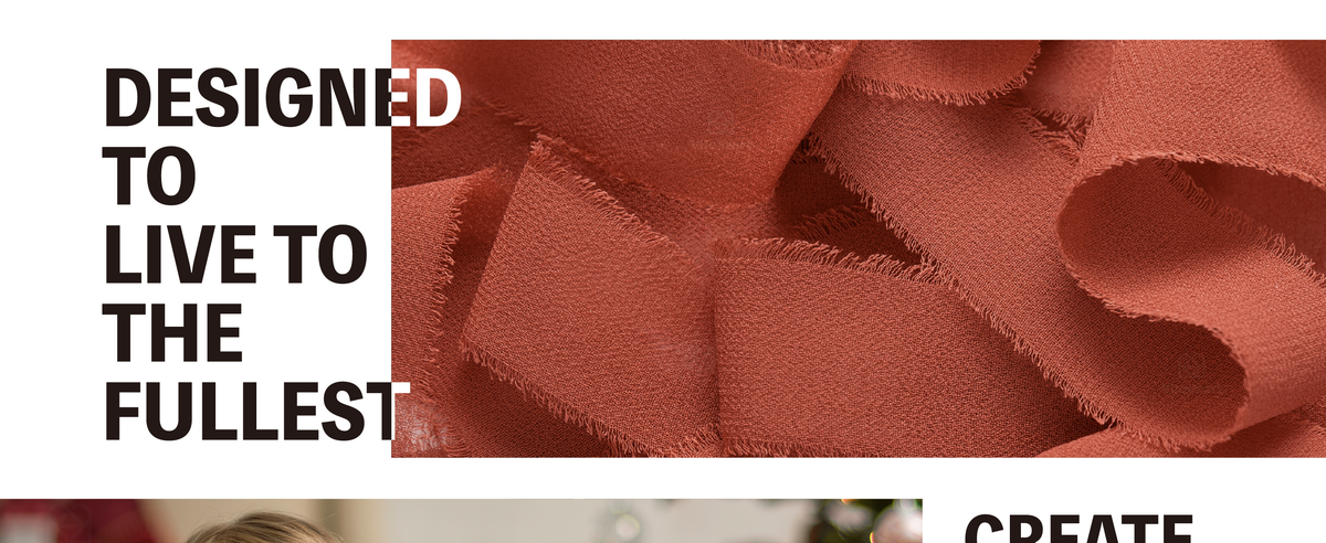 Loose rust-red chiffon ribbon forms layered loops, showing its fine weave and softly frayed edges.