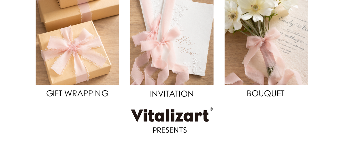 Blush pink chiffon ribbon decorates kraft gifts, embossed invitations, and a white flower bouquet.
